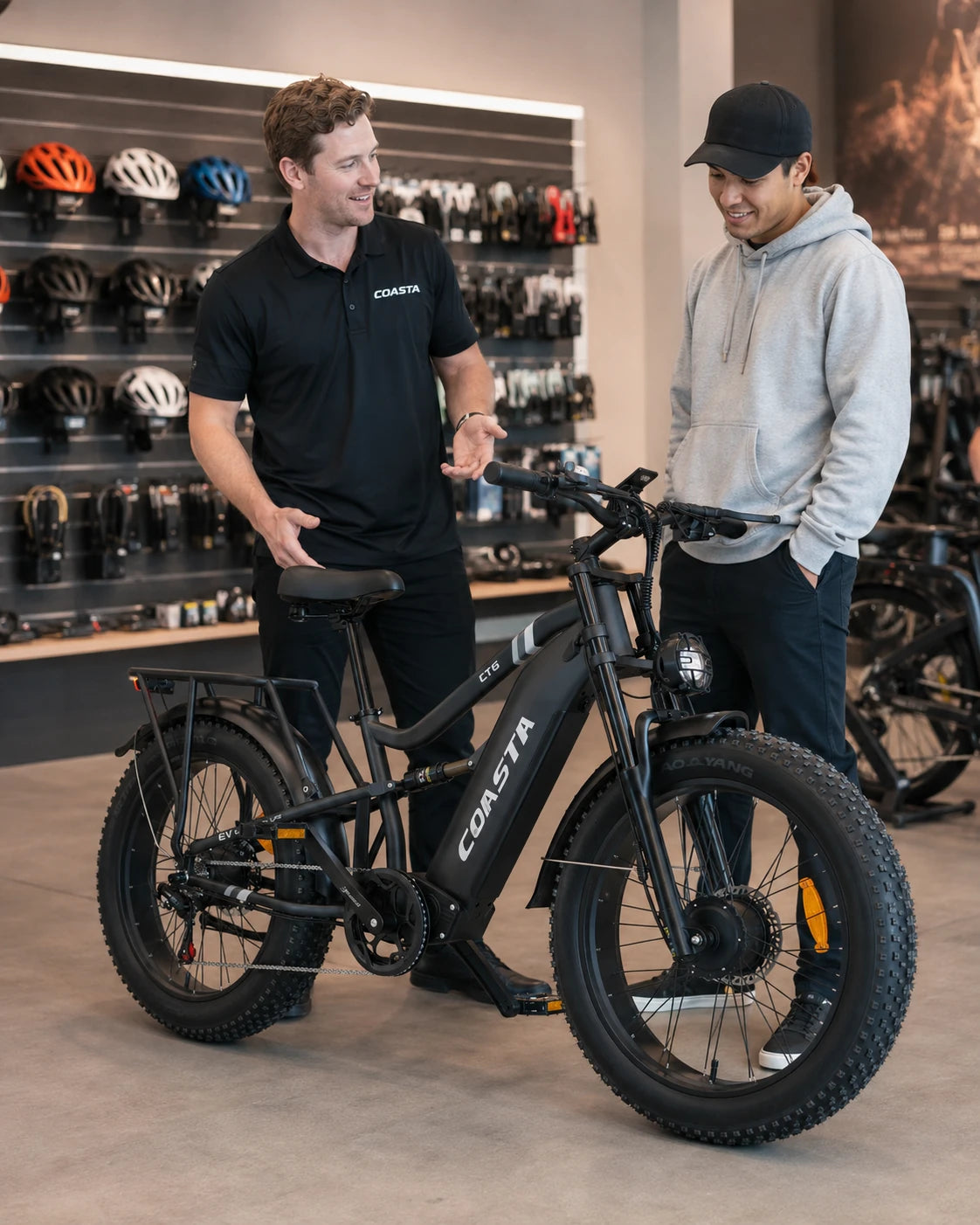 COASTA CT6 consultation inside a modern e-bike showroom