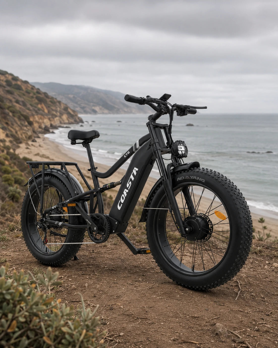 COASTA CT6 fat tire e-bike on an overcast coastal trail